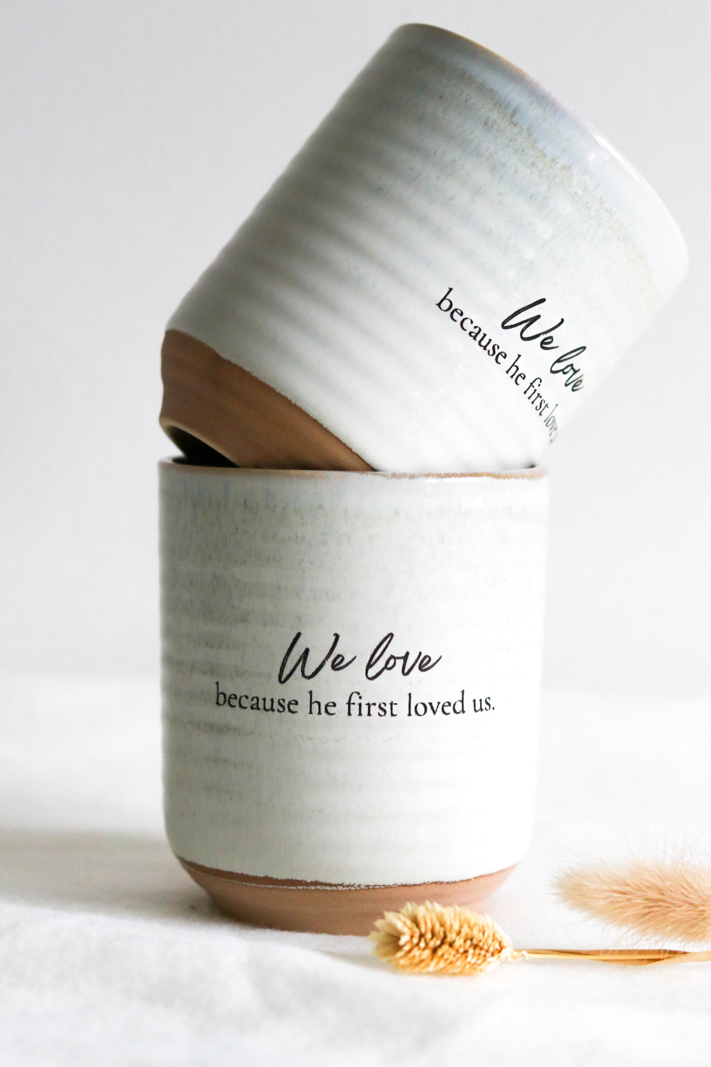 Tasse ohne Henkel | "We love because he first loved us"