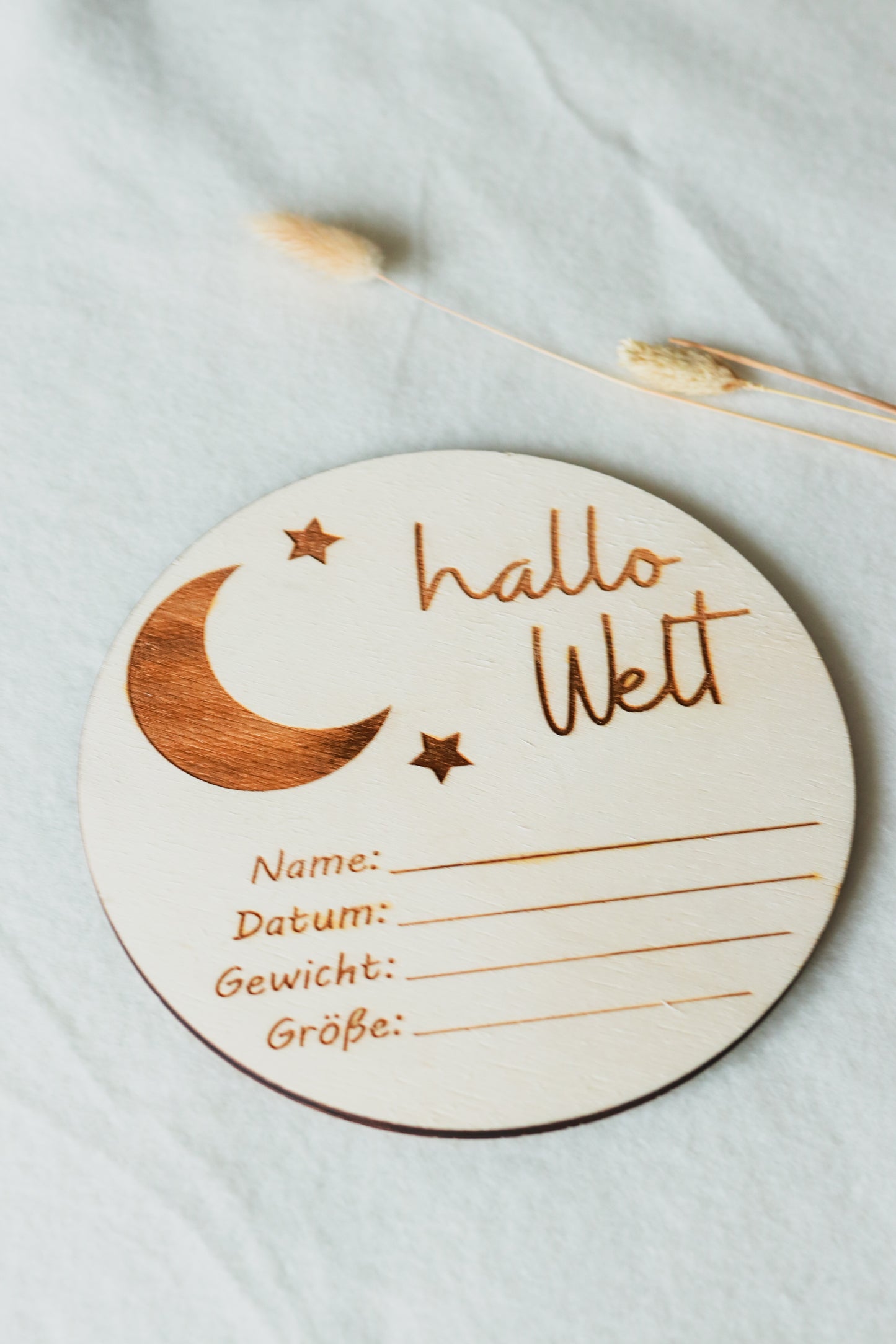 Holzschild zur Geburt